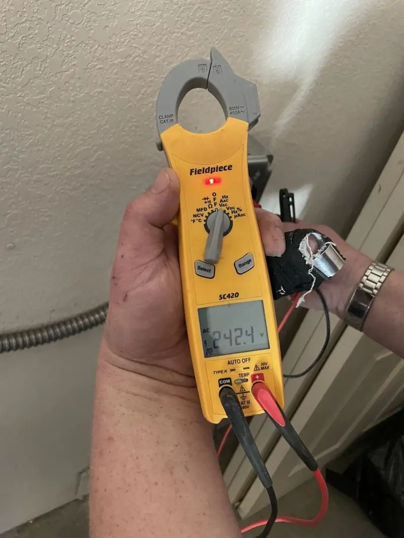 Voltage testing with clamp meter during Generator Installation in Montebello